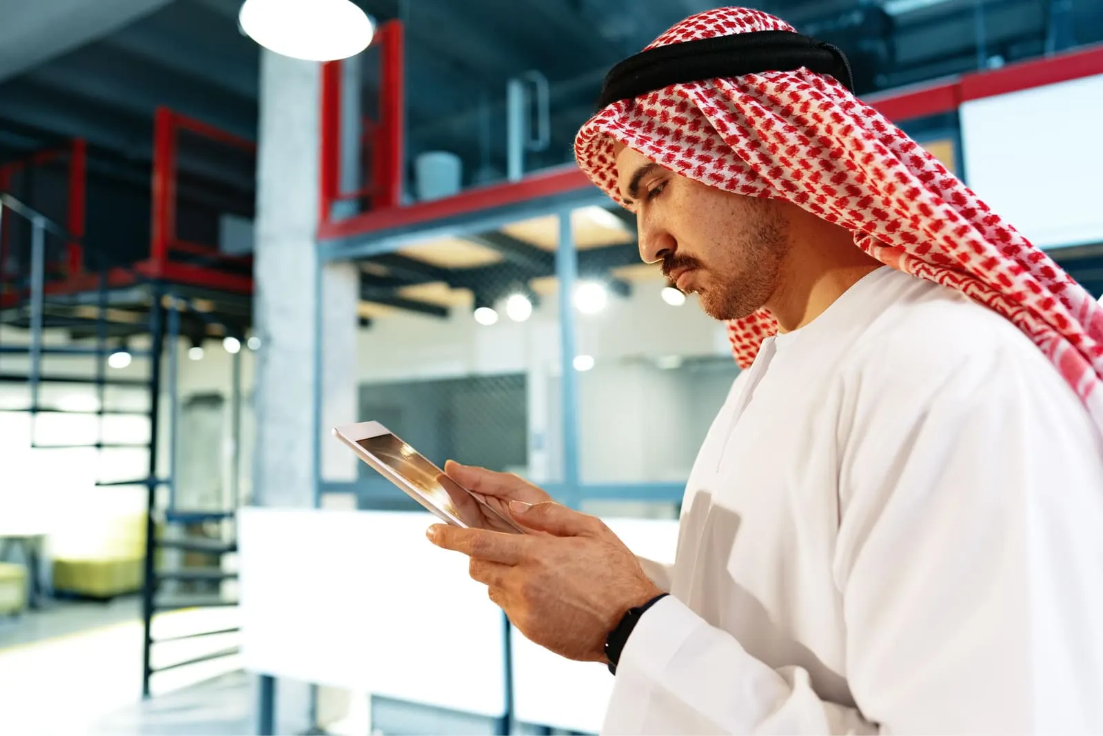 Professional ISO consultation in a modern Saudi office