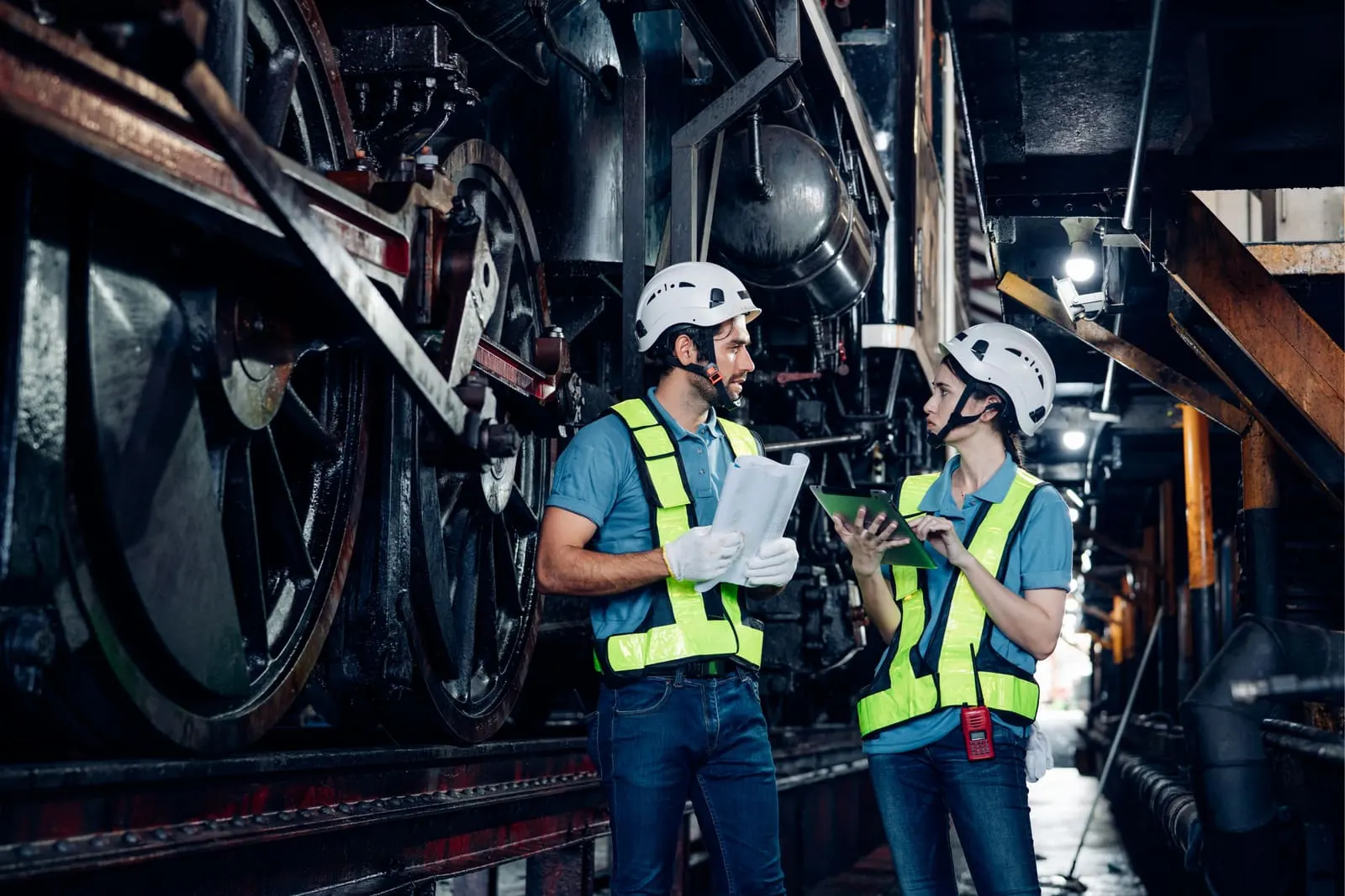 Safety inspectors reviewing industrial ISO compliance standards